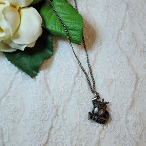 Silver Toned Rustic Pendant Necklace With Drum & Banner 1776